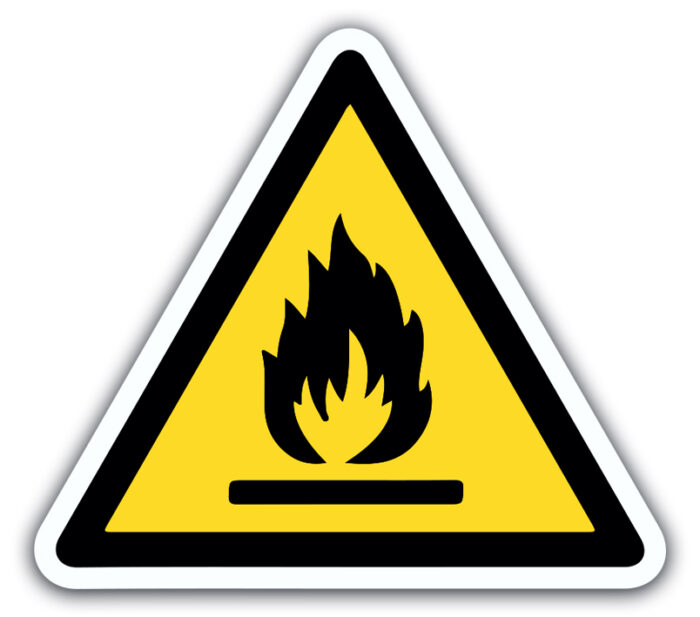 Cartel de advertencia de materiales combustibles o inflamables